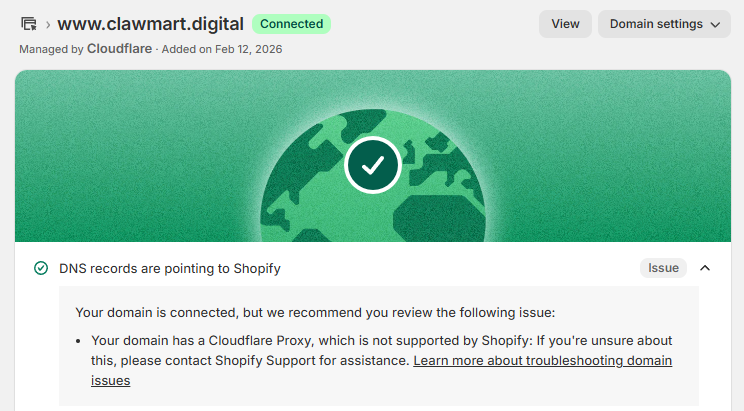 Shopify domain settings showing the domain connected with a green status, and an amber issue below it warning that the domain has a Cloudflare proxy that is not supported by Shopify