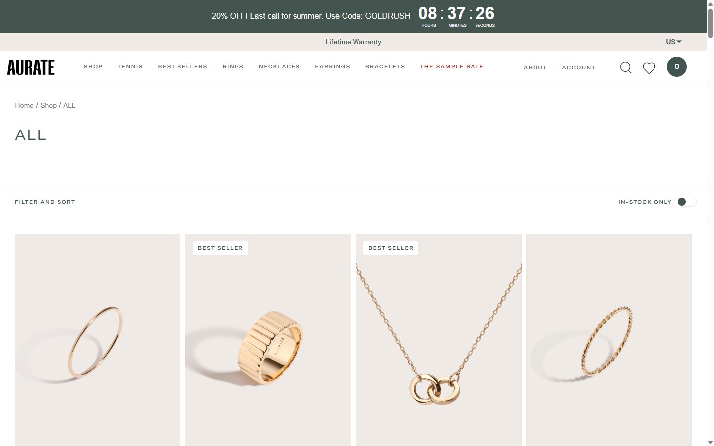 Aurate collection: all on desktop, Shopify luxury jewelry storefront captured at 1440 x 900