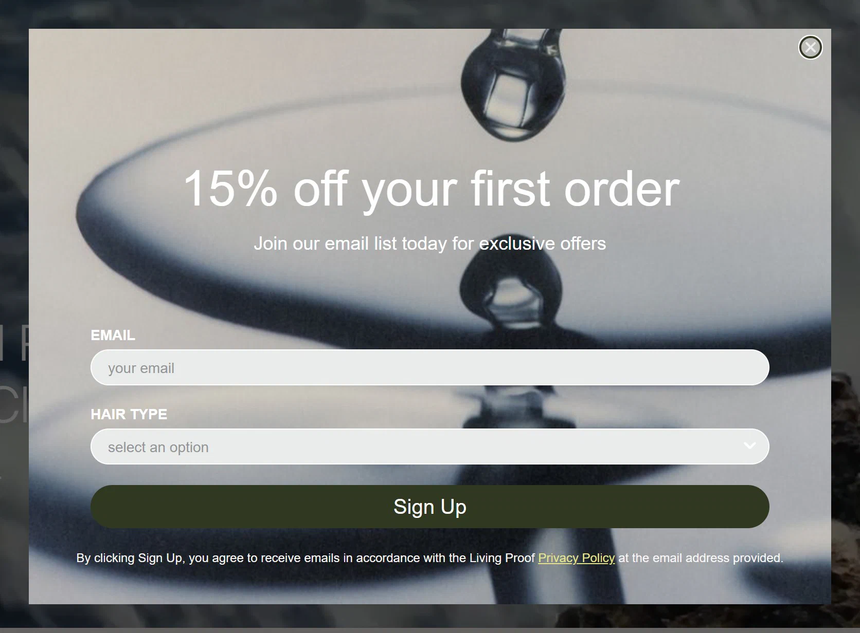 Living Proof email sign up popup, centred centre, offering 15% off
