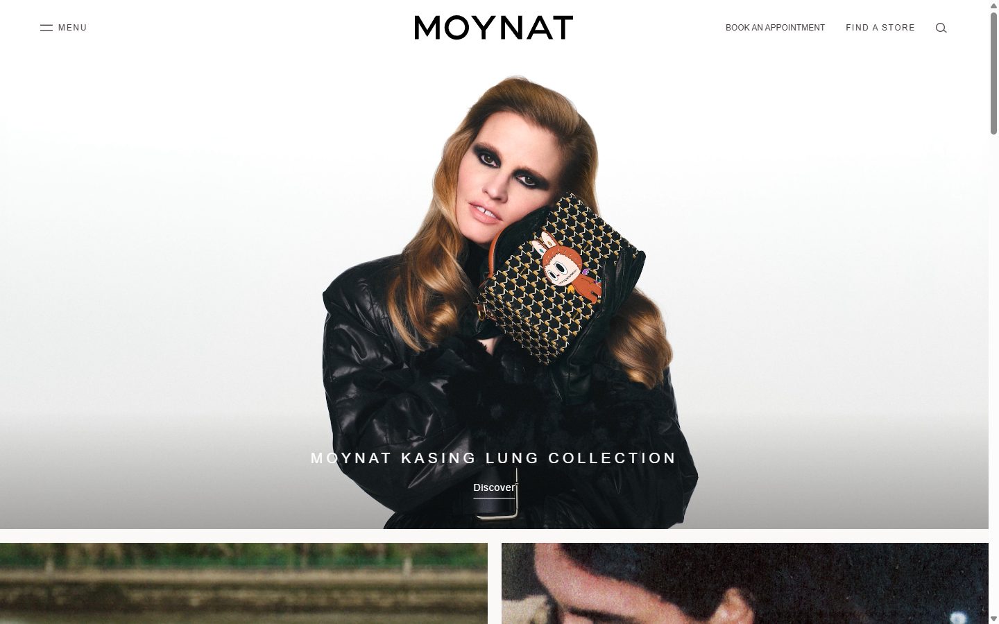 Moynat homepage on desktop, not disclosed luxury leather goods storefront captured at 1440 x 900
