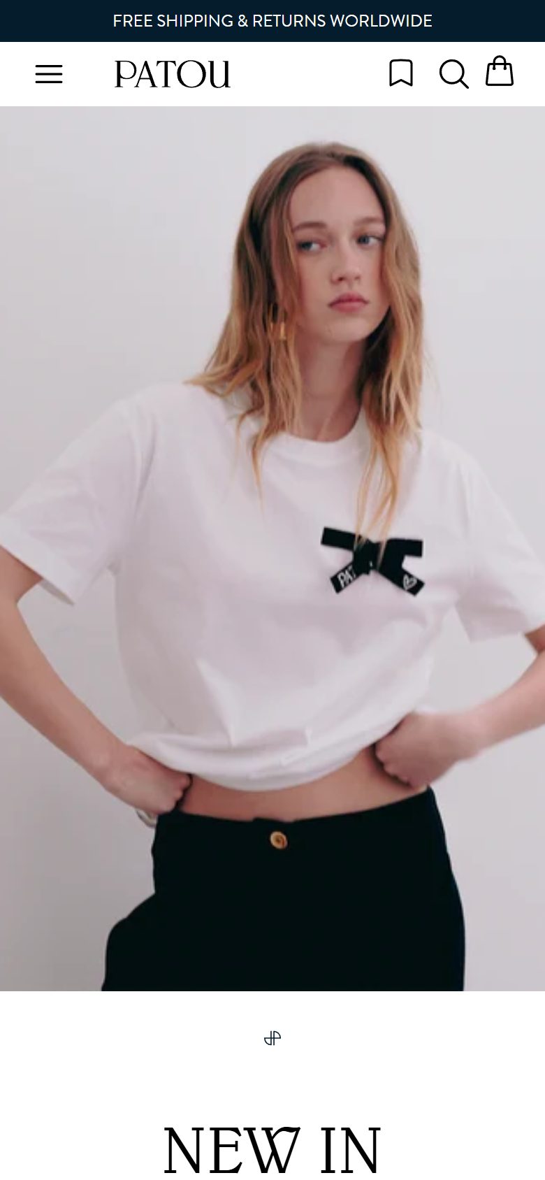 Patou homepage on mobile, Shopify luxury fashion storefront captured at 390 x 844