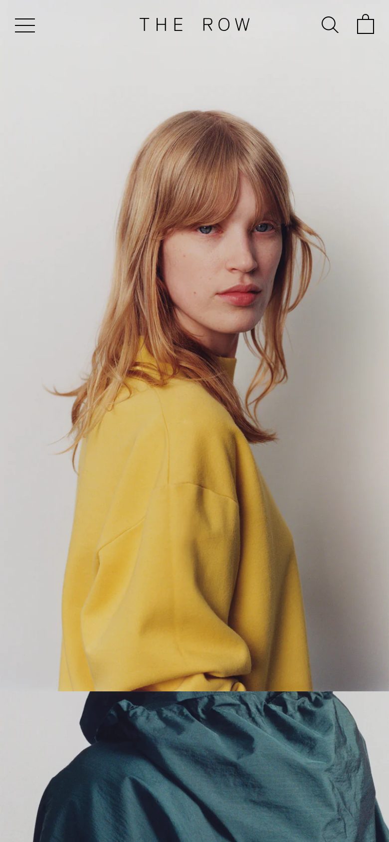 The Row homepage on mobile, not disclosed luxury fashion storefront captured at 390 x 844